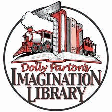 Row of books with train bookends, sitting on an open book. Text reads Dolly Parton's Imagination Library